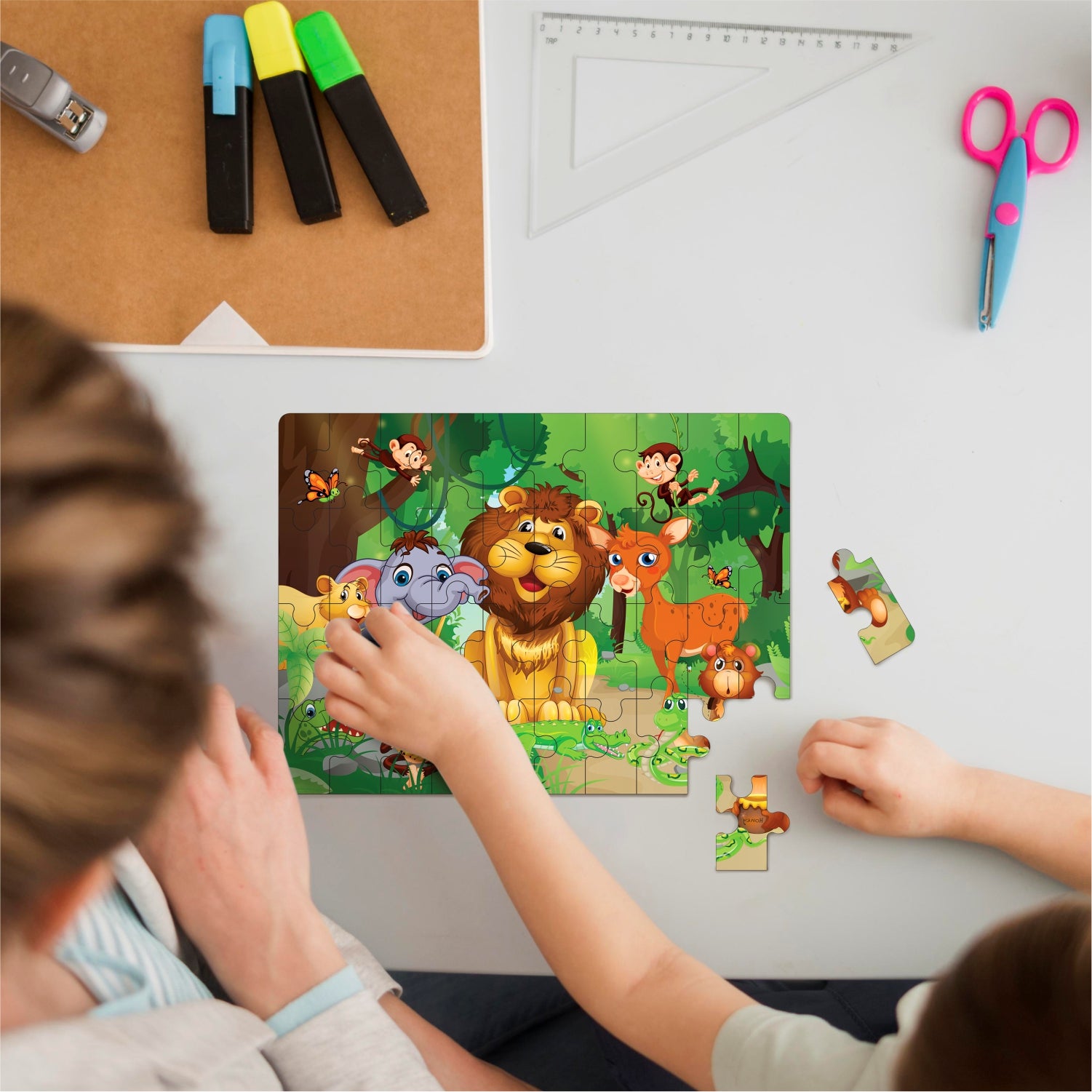 Jigsaw puzzle set for kids featuring live puzzle.