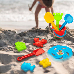 Kids playing in sand with moulds