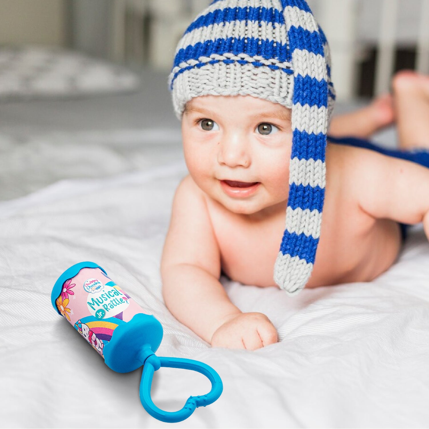 kid playing with rattle
