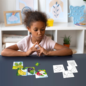kid playing with Jigsaw puzzle set