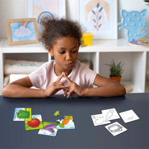 kid playing with Jigsaw puzzle set