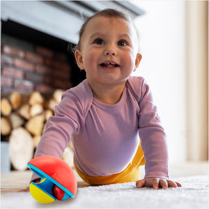 Kid playing with rattle set